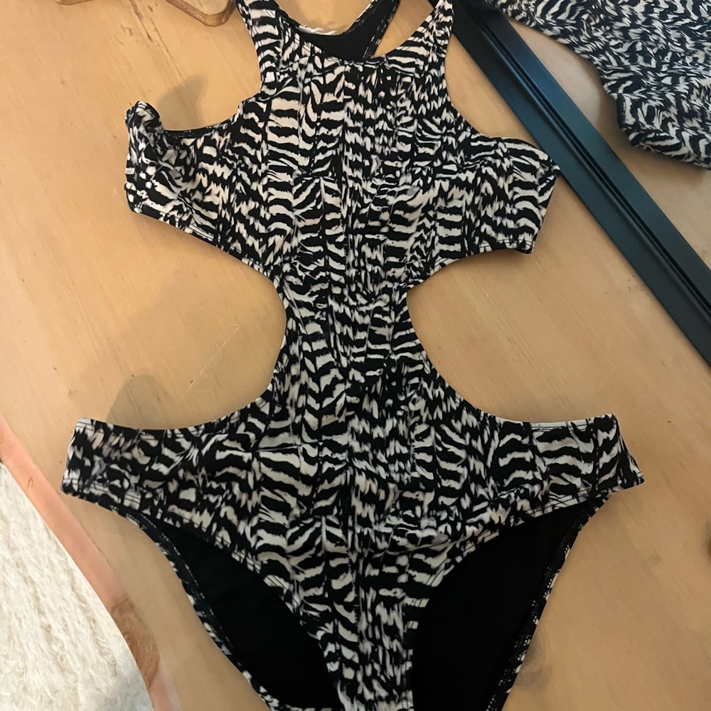 Out from Under One Piece Swimsuit sexy with some coverage
